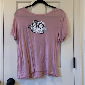 Pink shirt with Angels on the front.